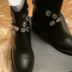 I N C black boots with rhinestones.